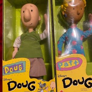 Three Disneys Doug Dolls. Never been out of box